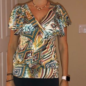 Picture does not fair to this beautiful top.